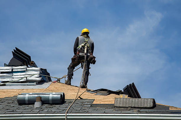 Professional Roof Replacement technician working in Clinton, IL